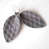 grey petal leather earrings